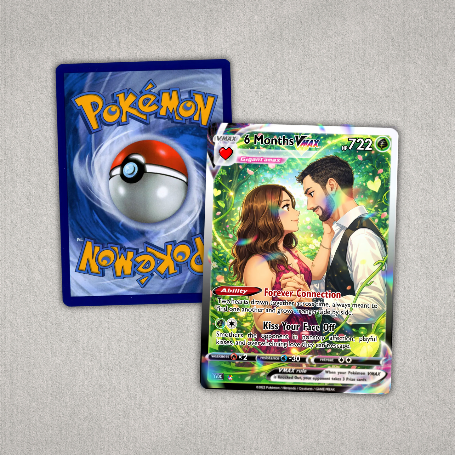 Two trading cards, one Pokémon and one featuring a couple, on a gray background.