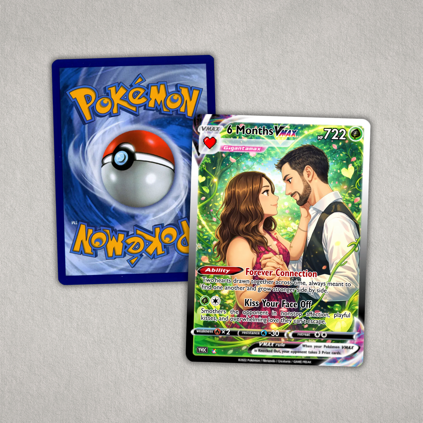 Two trading cards, one Pokémon and one featuring a couple, on a gray background.